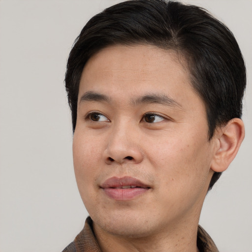 Neutral asian young-adult male with short  black hair and brown eyes