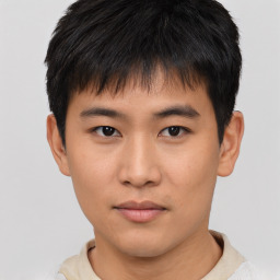 Neutral asian young-adult male with short  brown hair and brown eyes