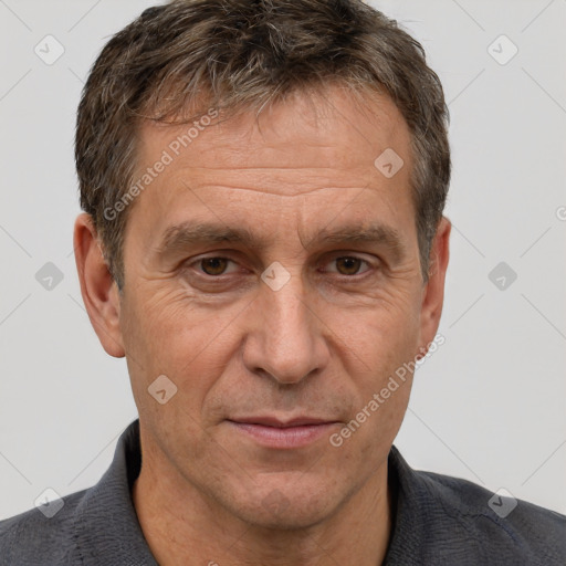 Joyful white middle-aged male with short  brown hair and brown eyes