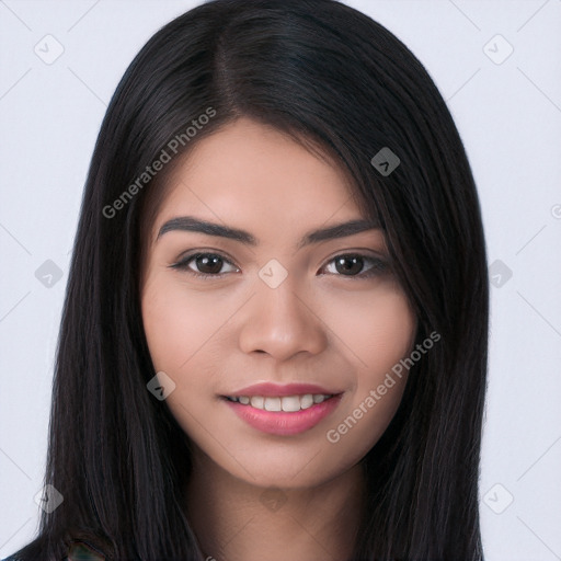 Joyful asian young-adult female with long  brown hair and brown eyes