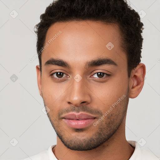 Neutral white young-adult male with short  brown hair and brown eyes