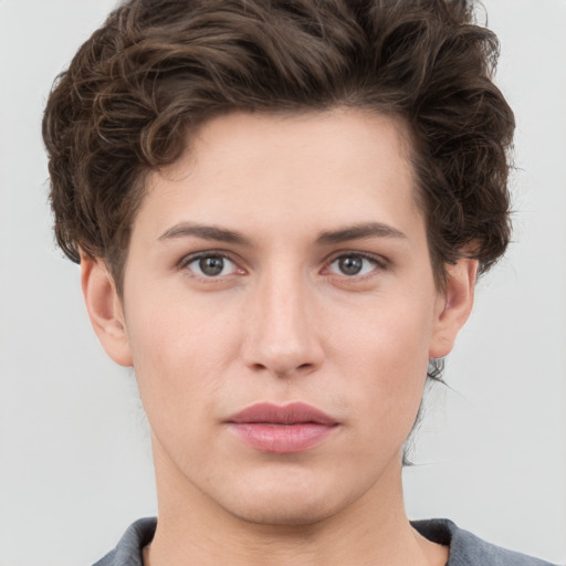 Neutral white young-adult female with short  brown hair and brown eyes