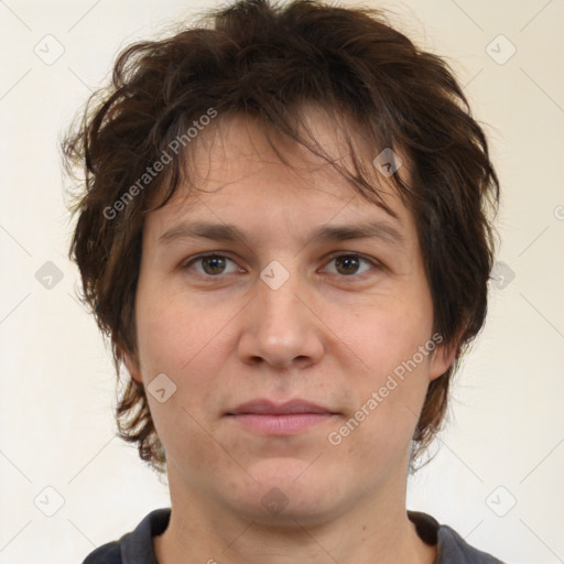 Joyful white young-adult male with medium  brown hair and brown eyes