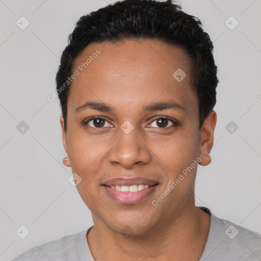 Joyful latino young-adult female with short  black hair and brown eyes
