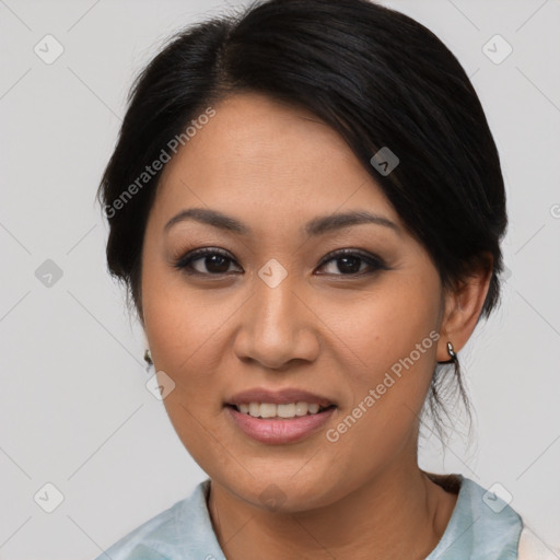 Joyful asian young-adult female with medium  black hair and brown eyes