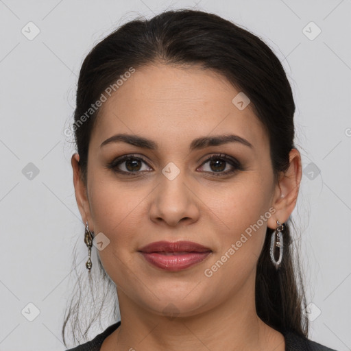 Joyful white young-adult female with long  brown hair and brown eyes