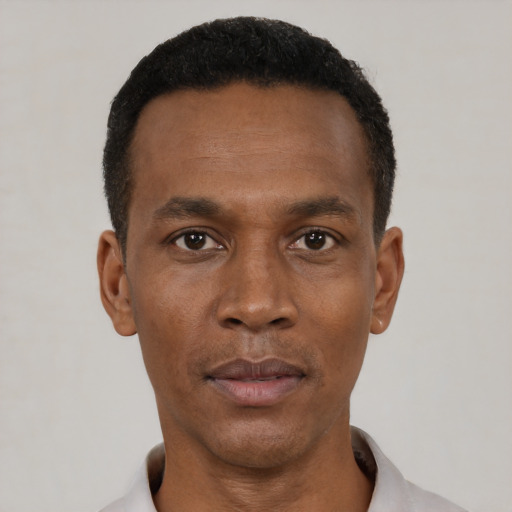 Neutral black young-adult male with short  black hair and brown eyes