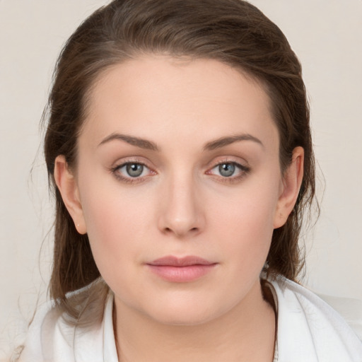 Neutral white young-adult female with medium  brown hair and grey eyes