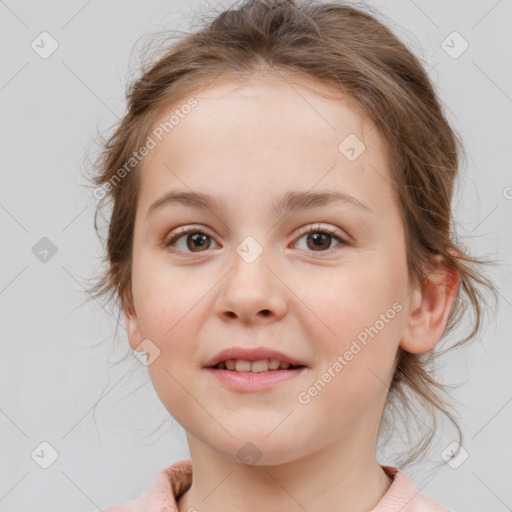 Joyful white child female with medium  brown hair and brown eyes