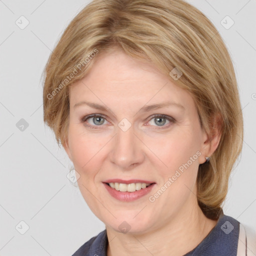 Joyful white young-adult female with medium  brown hair and blue eyes