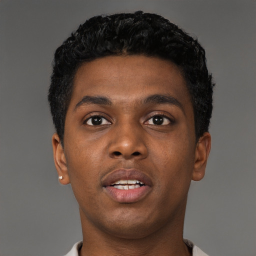 Neutral black young-adult male with short  black hair and brown eyes