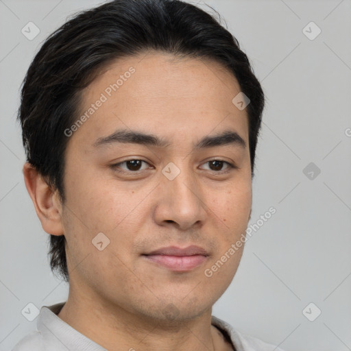 Joyful asian young-adult male with short  brown hair and brown eyes