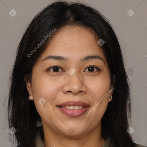 Joyful asian young-adult female with long  brown hair and brown eyes