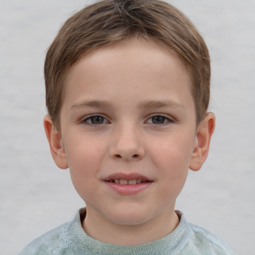 Joyful white child female with short  brown hair and grey eyes