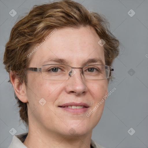 Joyful white adult female with medium  brown hair and blue eyes