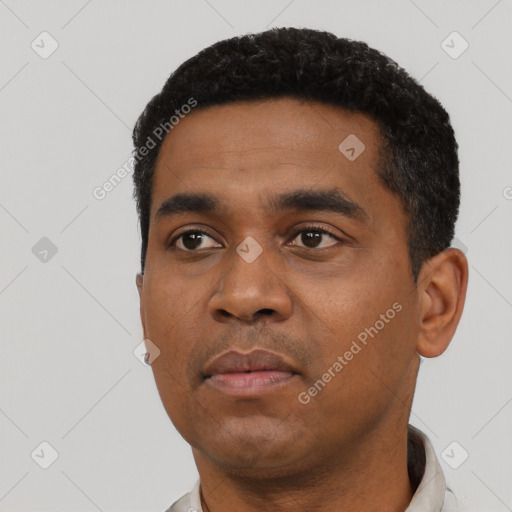 Neutral black young-adult male with short  black hair and brown eyes