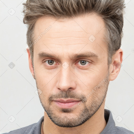 Neutral white adult male with short  brown hair and brown eyes