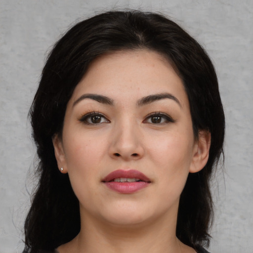 Neutral white young-adult female with medium  black hair and brown eyes