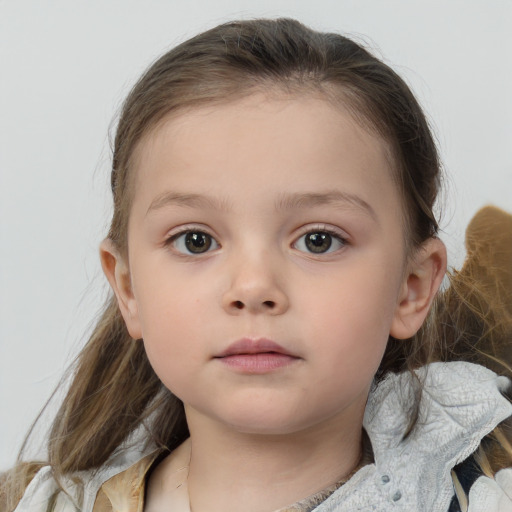 Neutral white child female with medium  brown hair and brown eyes