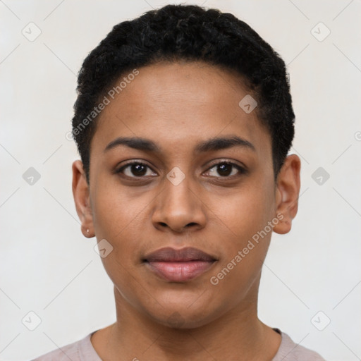 Joyful black young-adult female with short  black hair and brown eyes