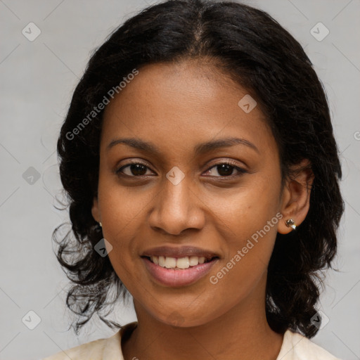 Joyful black young-adult female with medium  brown hair and brown eyes