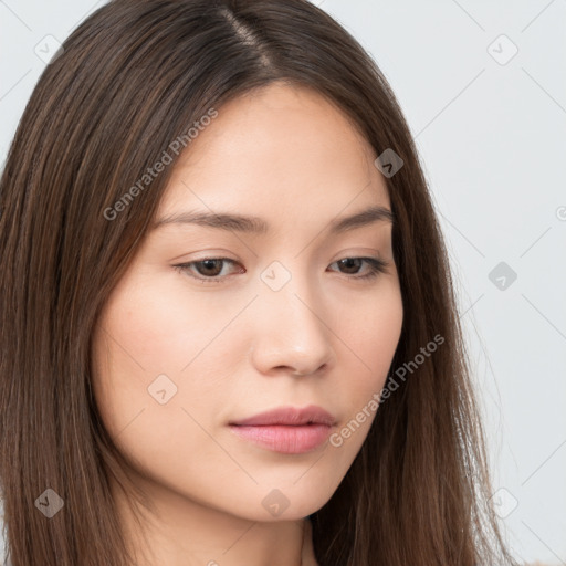 Neutral white young-adult female with long  brown hair and brown eyes