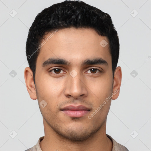 Neutral latino young-adult male with short  black hair and brown eyes