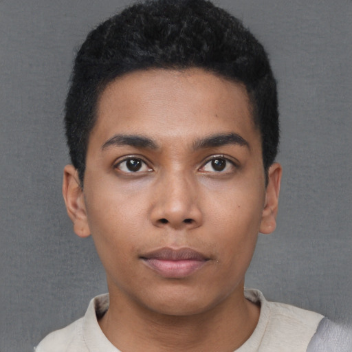 Neutral black young-adult male with short  black hair and brown eyes