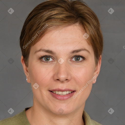 Joyful white adult female with short  brown hair and grey eyes