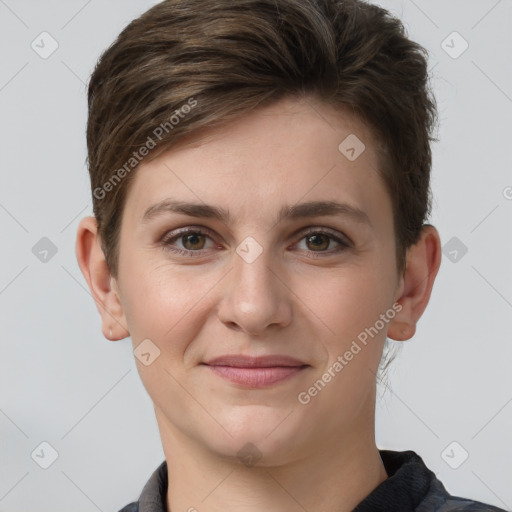 Joyful white young-adult female with short  brown hair and grey eyes