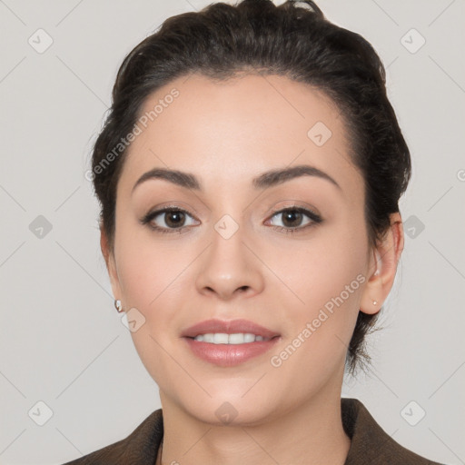 Joyful white young-adult female with short  black hair and brown eyes