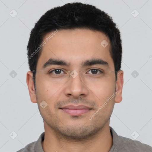 Joyful latino young-adult male with short  black hair and brown eyes