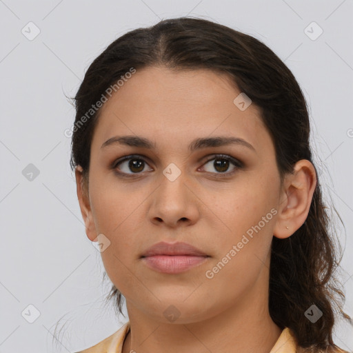 Neutral white young-adult female with long  brown hair and brown eyes