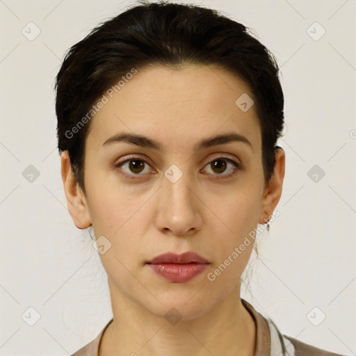 Neutral white young-adult female with short  brown hair and brown eyes