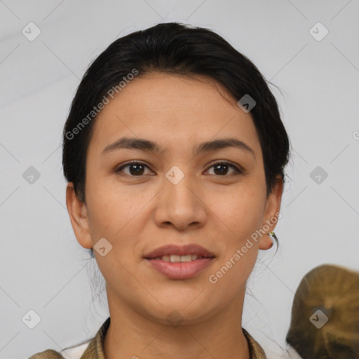 Joyful latino young-adult female with medium  brown hair and brown eyes