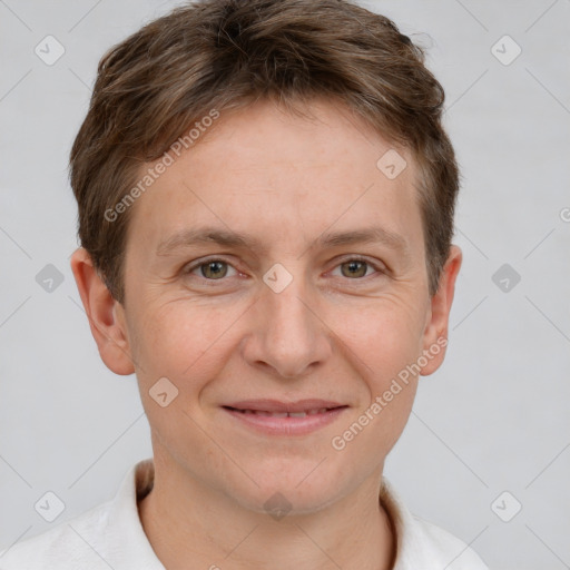 Joyful white adult male with short  brown hair and grey eyes