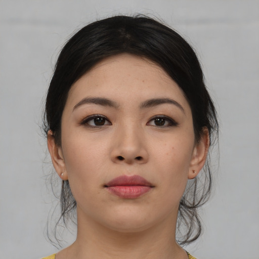 Neutral asian young-adult female with medium  black hair and brown eyes