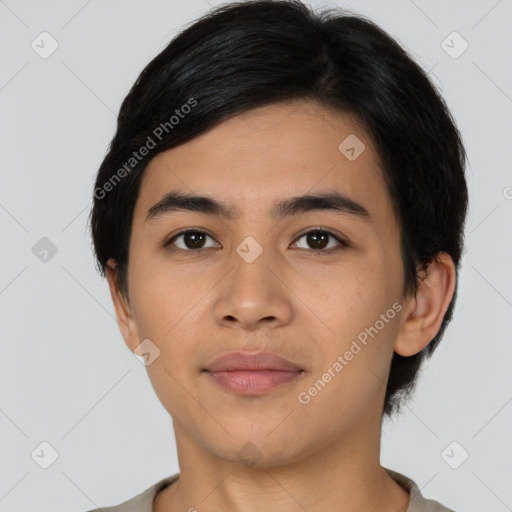 Joyful latino young-adult male with short  black hair and brown eyes