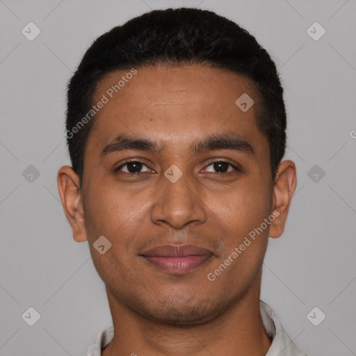 Joyful latino young-adult male with short  black hair and brown eyes