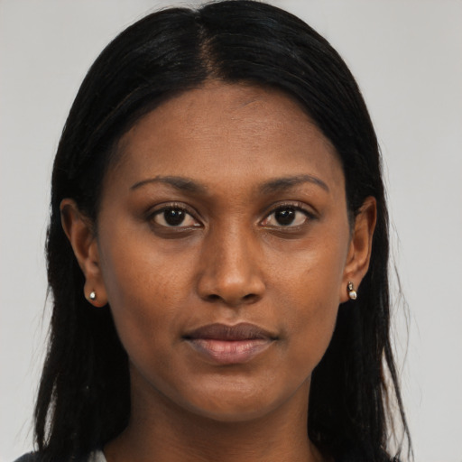 Neutral black young-adult female with long  black hair and brown eyes