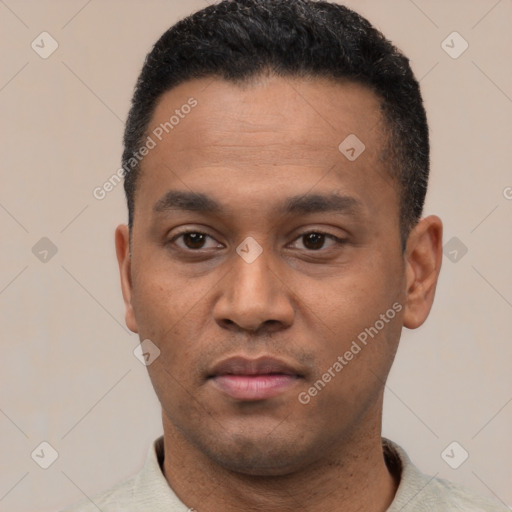 Neutral latino young-adult male with short  black hair and brown eyes