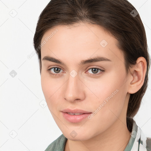 Neutral white young-adult female with medium  brown hair and brown eyes