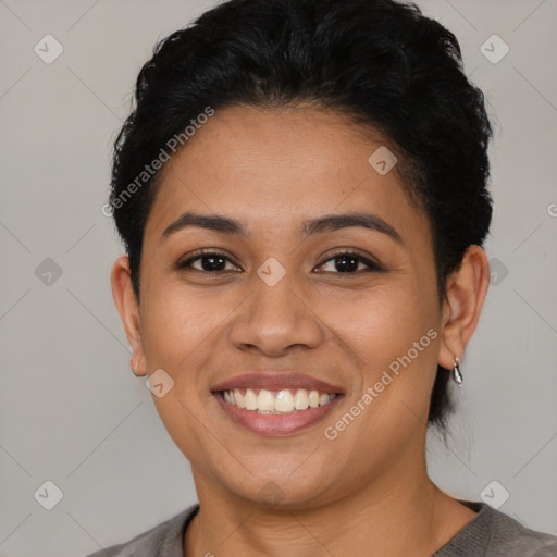 Joyful latino young-adult female with short  brown hair and brown eyes