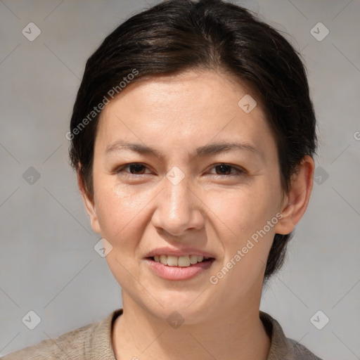 Joyful white adult female with medium  brown hair and brown eyes