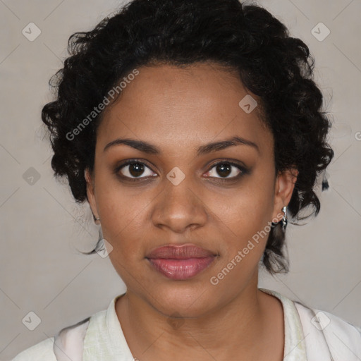 Joyful black young-adult female with medium  brown hair and brown eyes