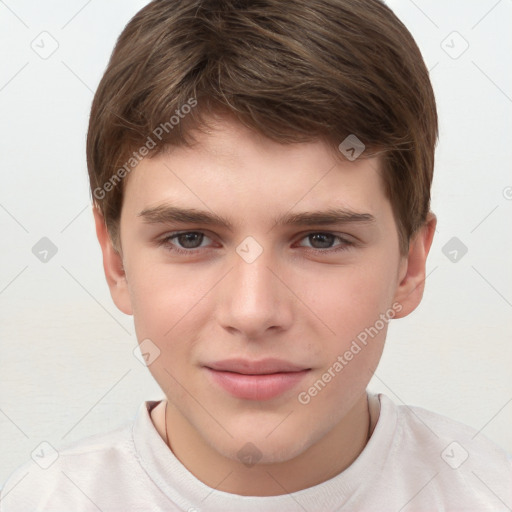 Joyful white child male with short  brown hair and brown eyes