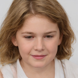 Joyful white child female with medium  brown hair and brown eyes