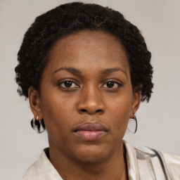 Neutral black young-adult female with short  brown hair and brown eyes