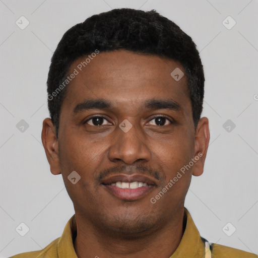 Joyful latino young-adult male with short  black hair and brown eyes