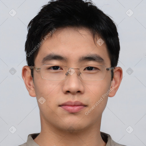 Neutral asian young-adult male with short  brown hair and brown eyes